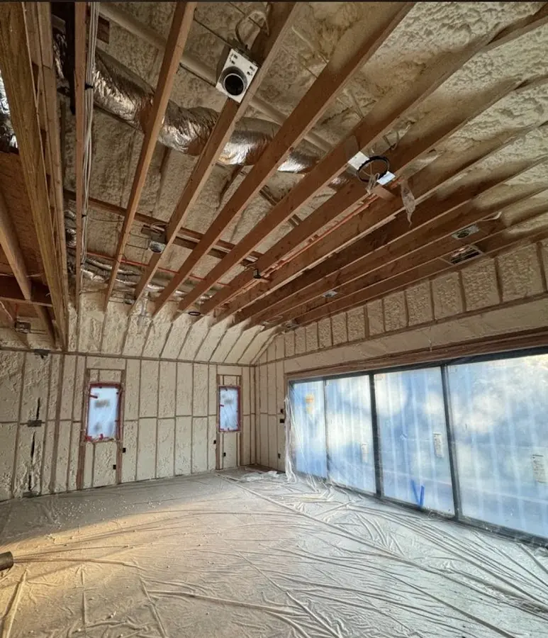 Interior walls and ceiling insulated with spray foam during new construction in Danbury